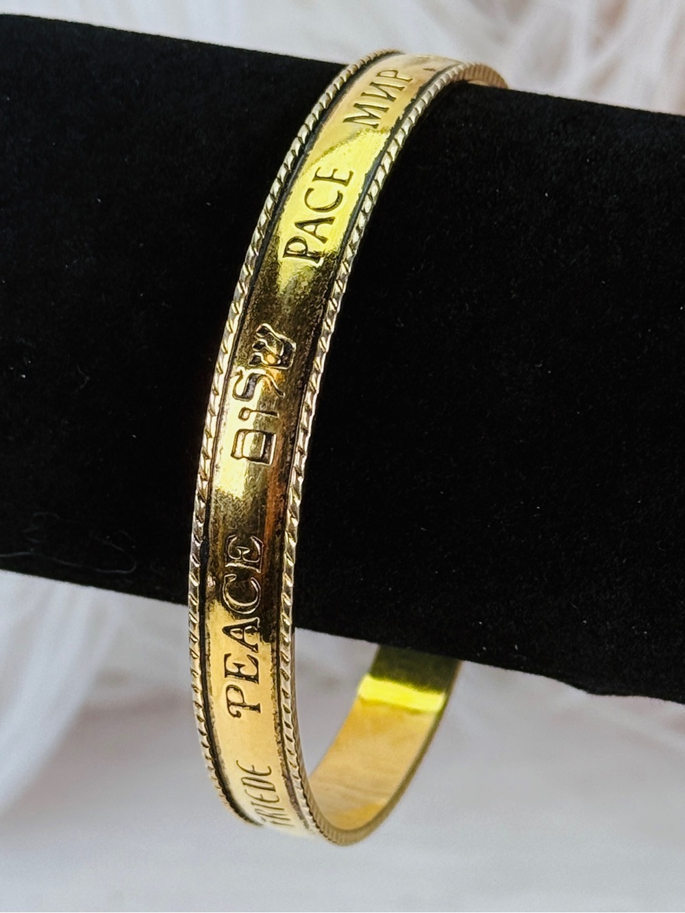 Vintage Avon “Let there be peace” inscribed, goldtone bangle bracelet
